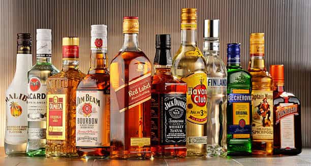 A selection of premium liquor bottles and glassware