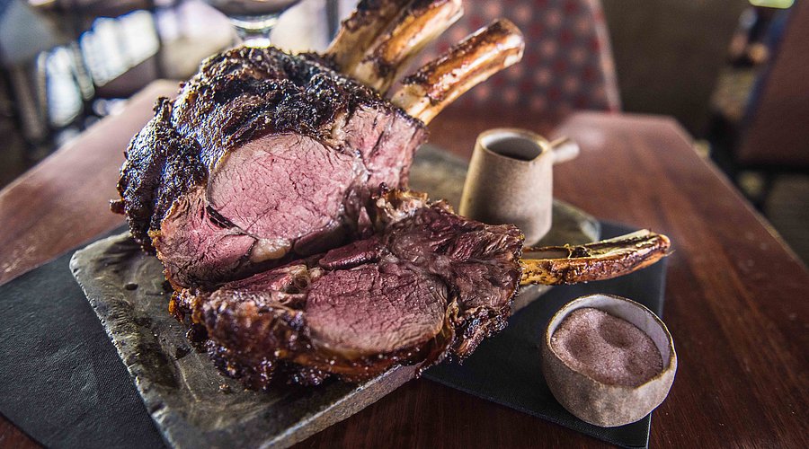 Steak night table setting with premium cuts